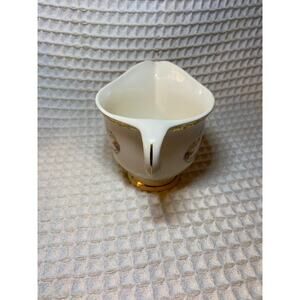 Elegant vintage Sebring brand 22krt gold creamer dispenser made in USA